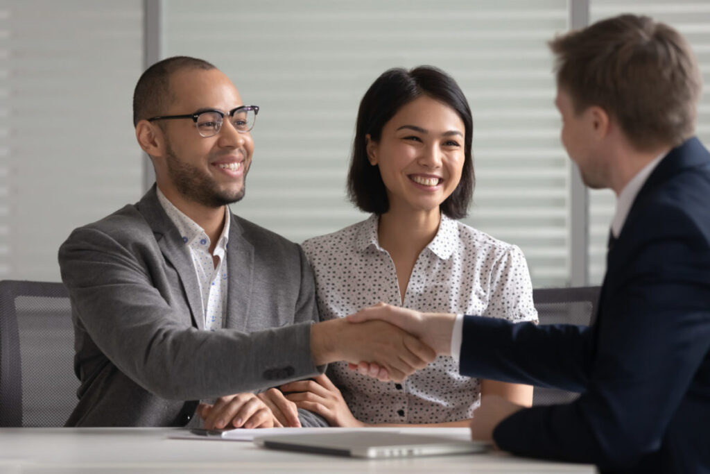 married couple meeting with new york trust planning lawyer